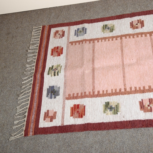 3 - A Swedish Flatweave rug, geometric polychrome design, pink and brown centre, 190 x 122cm