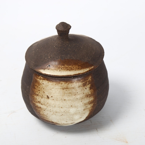 35 - Janet Leach (1918-1997), St Ives Pottery, a stoneware lidded pot with nuka glaze sides, pottery and ... 