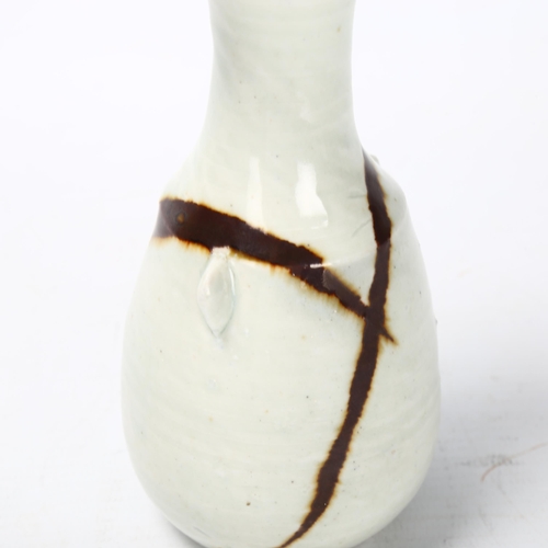 36 - Janet Leach (1918-1997), St Ives Pottery, a porcelain vase with iron slash through white glaze, pott... 