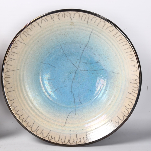 55 - John Dunn (b1944), 2 large Raku studio pottery centre bowls, signed to base, diameter of both 33.5cm