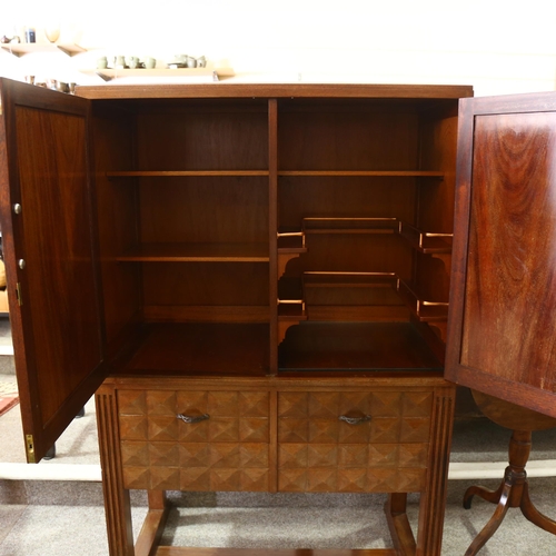 56 - A brutalist cube cut faceted cocktail cabinet with fitted interior over 2 drawers, mid-late 20th cen... 