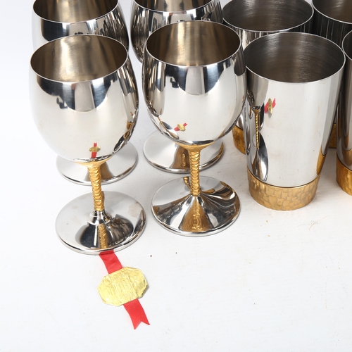 74 - Stuart Devlin for Viners, a set of 8 Devlin Collection stainless steel wine goblets with textured st... 