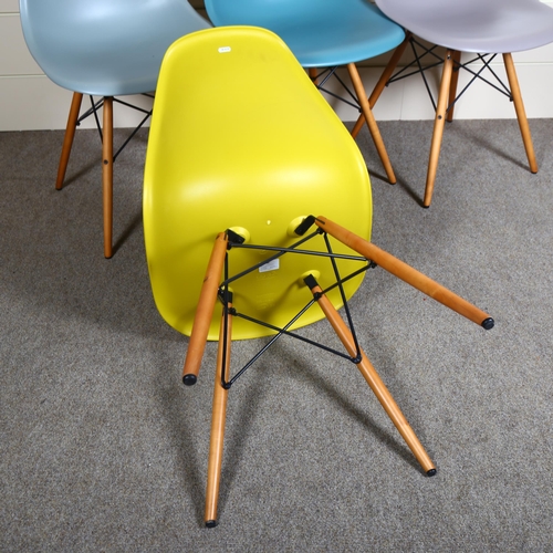 84 - 4 Vitra Eames DSW side chairs, harlequin set on golden maple legs, makers stamps and original labels... 