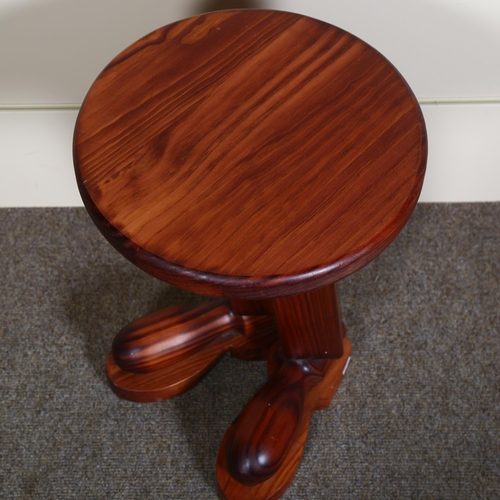 87 - A 1960s pine side table or stool in the form of a pair of boots, height 45cm