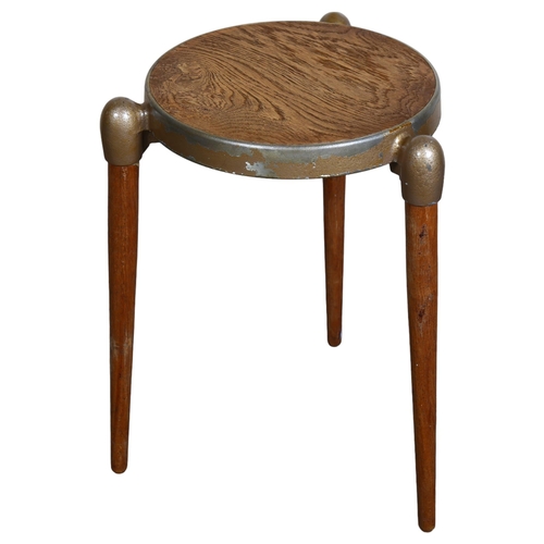 112 - Gerald Summers, a mid-century 3 legged stool with oak veneered cast metal seat, with maker’s marks, ... 