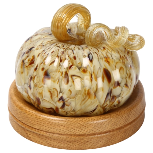 69 - A Murano hand made glass pumpkin on later turned oak base, diameter 17cm