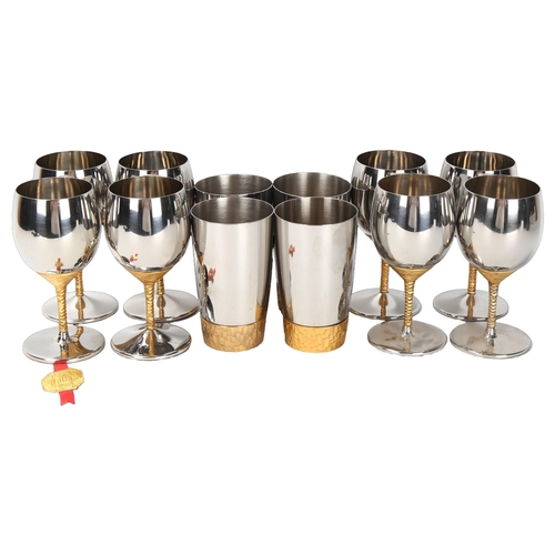 74 - Stuart Devlin for Viners, a set of 8 Devlin Collection stainless steel wine goblets with textured st... 