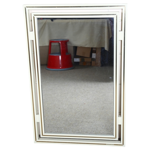 93 - Pierre Vandel, Paris, a vintage Hollywood Regency style mirror, frame size 89 x 60cm