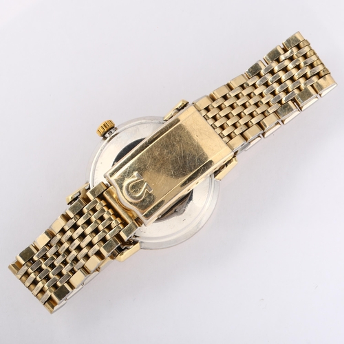 1003 - OMEGA - a gold plated stainless steel Seamaster De Ville automatic bracelet watch, silvered dial wit... 