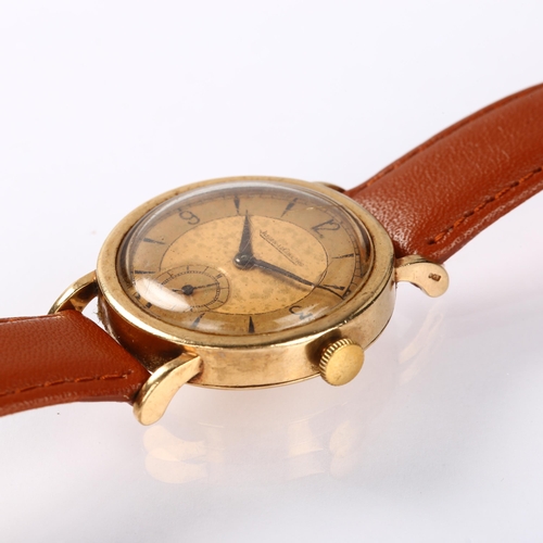 1004 - JAEGER LECOULTRE - a Vintage 9ct gold mechanical wristwatch, circa 1940s, champagne dial with quarte... 