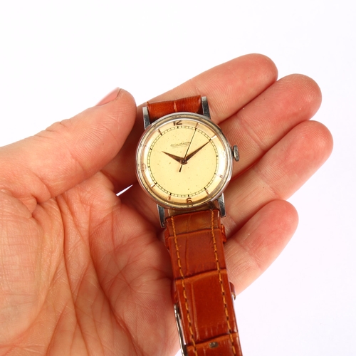 1015 - JAEGER LECOULTRE - a Vintage stainless steel mechanical wristwatch, circa 1950s, silvered dial with ... 