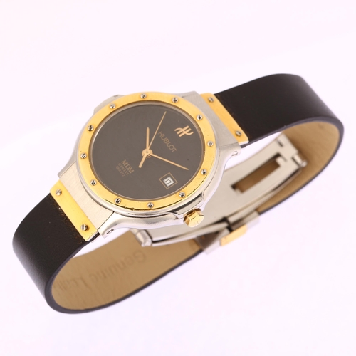 1017 - HUBLOT - a lady's stainless steel and gold MDM quartz calendar wristwatch, ref. S.139.10.2, black di... 