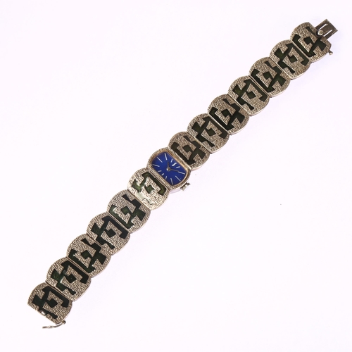 1026 - A lady's mid-century silver and enamel bracelet watch, blue enamel dial with white baton hour marker... 