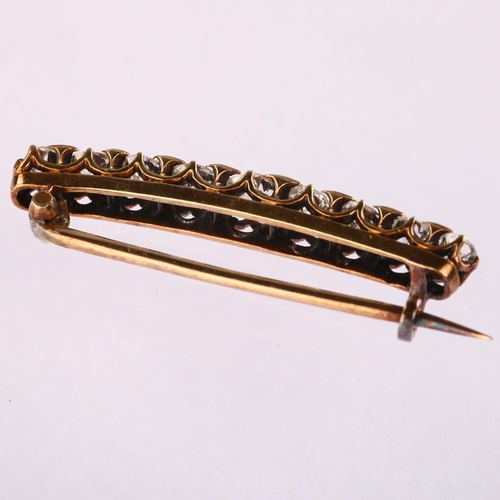 1116 - A Victorian graduated nine stone diamond line bar brooch, unmarked gold set with old European-cut di... 