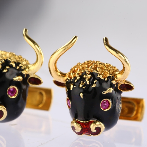 1118 - FRASCAROLO - a pair of Italian 18ct gold ruby and enamel bull cufflinks, each bull mask with black e... 