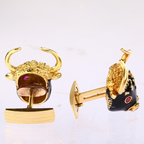 1118 - FRASCAROLO - a pair of Italian 18ct gold ruby and enamel bull cufflinks, each bull mask with black e... 