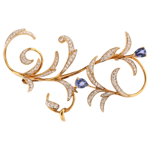 1121 - A late 20th century 14ct gold sapphire and diamond floral brooch, set with pear-cut sapphires and mo... 