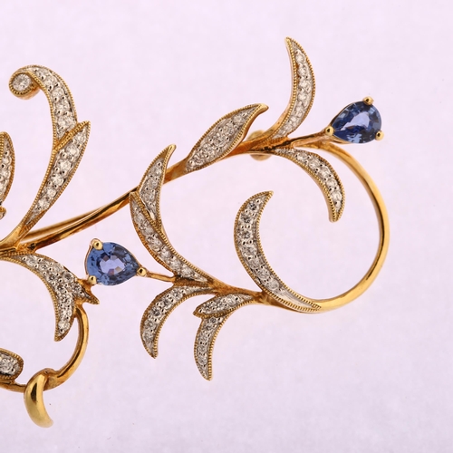 1121 - A late 20th century 14ct gold sapphire and diamond floral brooch, set with pear-cut sapphires and mo... 