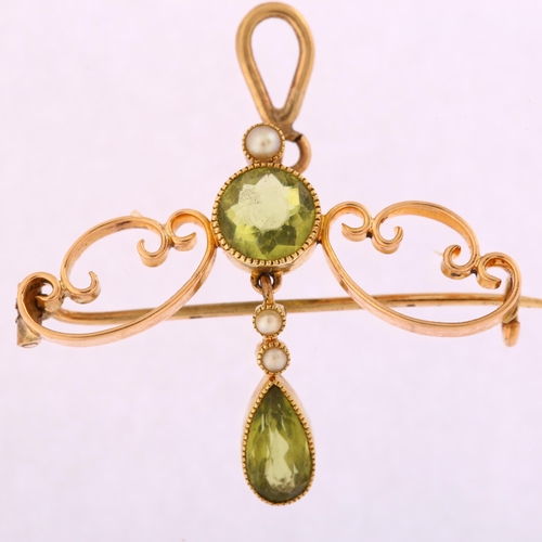 1123 - An Art Nouveau peridot and pearl openwork pendant/brooch, unmarked gold set with pear and round-cut ... 