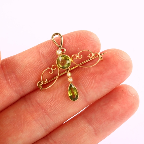 1123 - An Art Nouveau peridot and pearl openwork pendant/brooch, unmarked gold set with pear and round-cut ... 