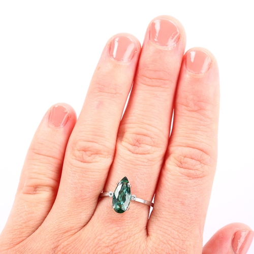 1125 - A modern 18ct white gold green tourmaline and diamond ring, set with long pear-cut tourmaline and si... 