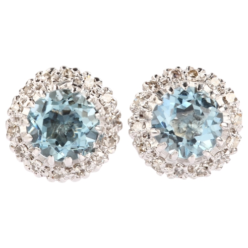 1126 - A pair of aquamarine and diamond round cluster earrings, unmarked white metal settings with round-cu... 