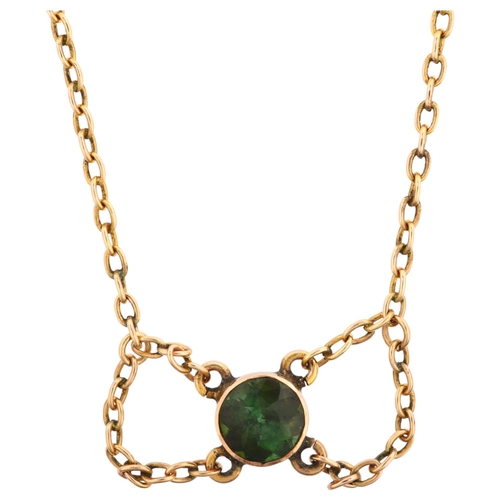 1127 - An Edwardian 9ct rose gold green tourmaline lavaliere necklace, bezel set with round-cut tourmaline ... 