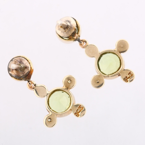 1128 - A pair of Edwardian 9ct gold peridot and pearl drop earrings, in quatrefoil form with stud fittings,... 