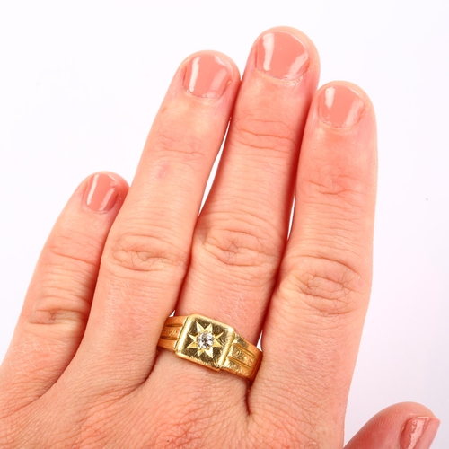 1129 - An early 20th century 18ct gold 0.15ct solitaire diamond signet ring, star set with old European-cut... 