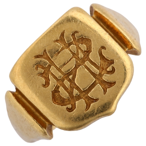 1130 - An early 20th century 18ct gold seal signet ring, maker JS&S, Birmingham 1921, shield form intaglio ... 