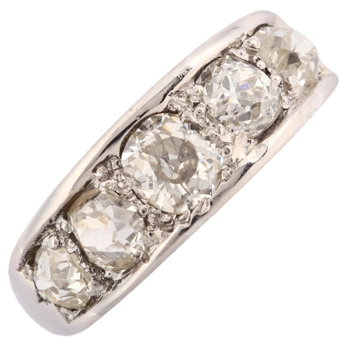 1132 - A graduated five stone diamond half hoop ring, unmarked white metal settings with old-cut diamonds, ... 