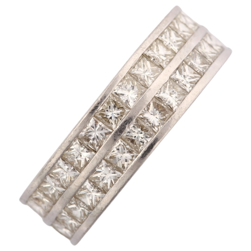 1133 - A platinum double-row full eternity ring, set with Princess-cut diamonds, total diamond content appr... 