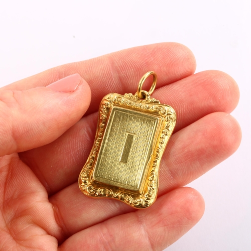 1134 - An Antique gold vinaigrette pendant, unmarked high carat gold settings with engine turned lid and ba... 