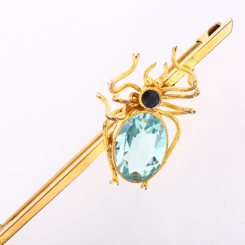 1137 - An Edwardian sapphire and blue topaz figural spider bar brooch, circa 1910, unmarked yellow metal se... 