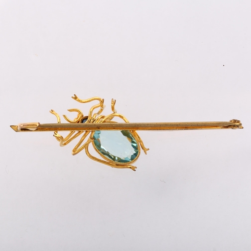 1137 - An Edwardian sapphire and blue topaz figural spider bar brooch, circa 1910, unmarked yellow metal se... 