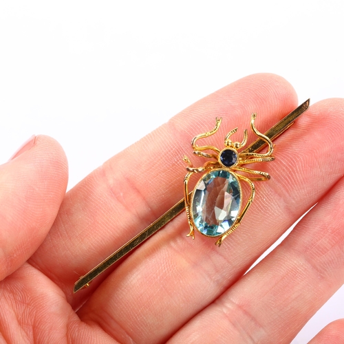 1137 - An Edwardian sapphire and blue topaz figural spider bar brooch, circa 1910, unmarked yellow metal se... 