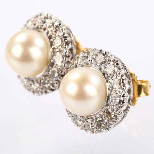 1139 - A pair of whole pearl and diamond round cluster earrings, unmarked white gold settings test as 18ct,... 