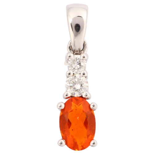 1145 - A modern spessartine garnet and diamond drop pendant, unmarked white gold settings, with oval mixed-... 