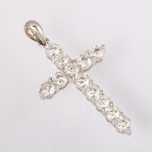 1155 - A modern 18ct white gold diamond cross pendant, prong set with modern round brilliant-cut diamonds, ... 