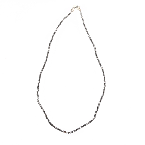 1156 - A modern 18ct white gold black diamond bead necklace, set with rough-cut black diamond beads, bead d... 