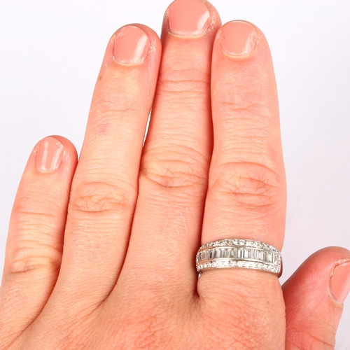 1159 - A modern 18ct white gold diamond half eternity band ring, channel set with baguette and modern round... 