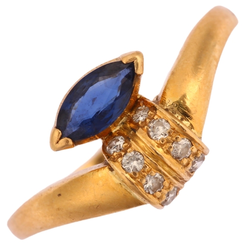 1260 - An 18ct gold sapphire and diamond dress ring, set with marquise-cut sapphire and modern round brilli... 
