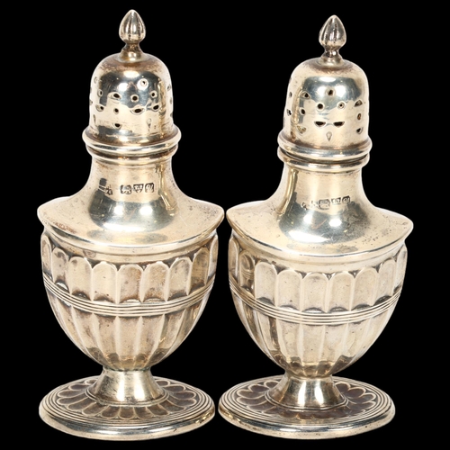 1525 - A pair of George V silver Adams style urn pepperettes, indistinct maker, Chester 1920, 10cm, 2.3oz