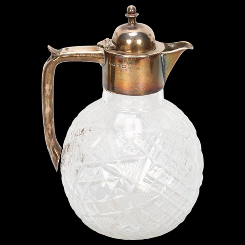 1540 - An Edwardian silver-mounted glass Claret jug, William Henry Leather, Birmingham 1904, globular form ... 