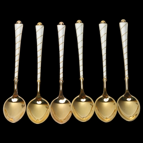 1542 - EGON LAURIDSEN - a set of 6 Danish vermeil sterling silver and white enamel coffee spoons, 9.5cm