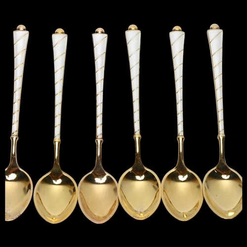 1542 - EGON LAURIDSEN - a set of 6 Danish vermeil sterling silver and white enamel coffee spoons, 9.5cm