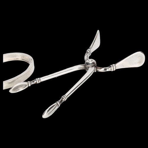 1548 - Various Danish silver, including sugar tongs, napkin ring and butter knife (3)