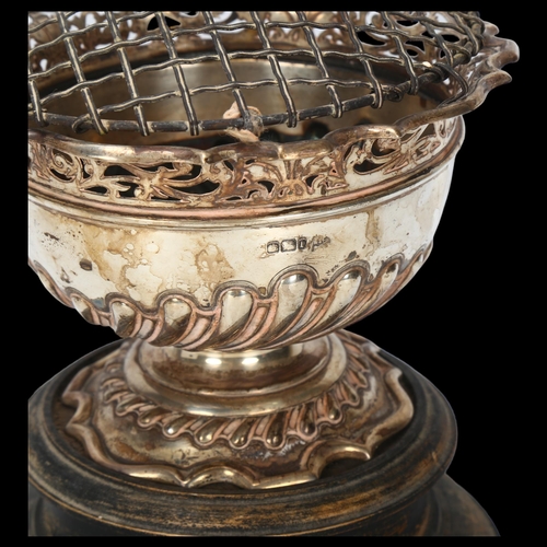 1553 - An Edwardian silver pedestal trophy rose bowl, Walker & Hall, Sheffield 1903, circular form with sca... 