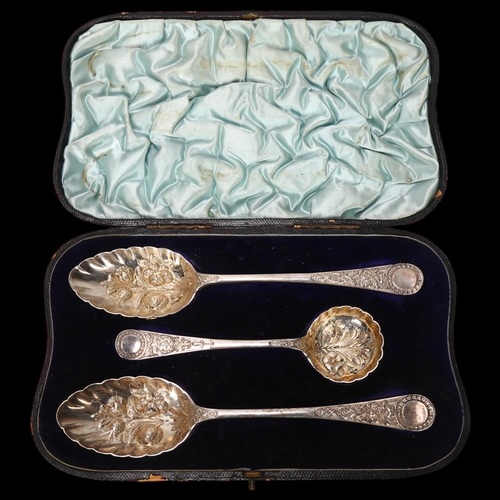 1554 - A Victorian cased set of silver berry spoons, William Hutton & Sons Ltd, London 1894, leaf embossed ... 