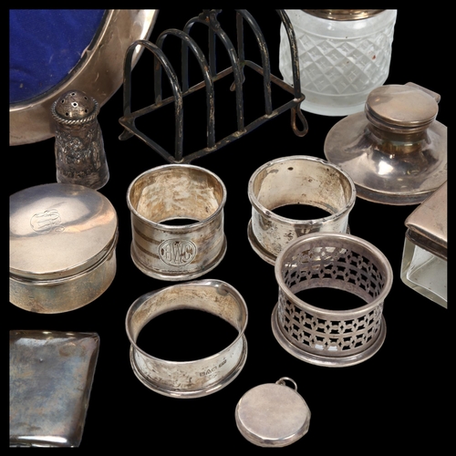 1579 - Various silver, including photo frame, pair of candlesticks, dressing table jar, toast rack etc